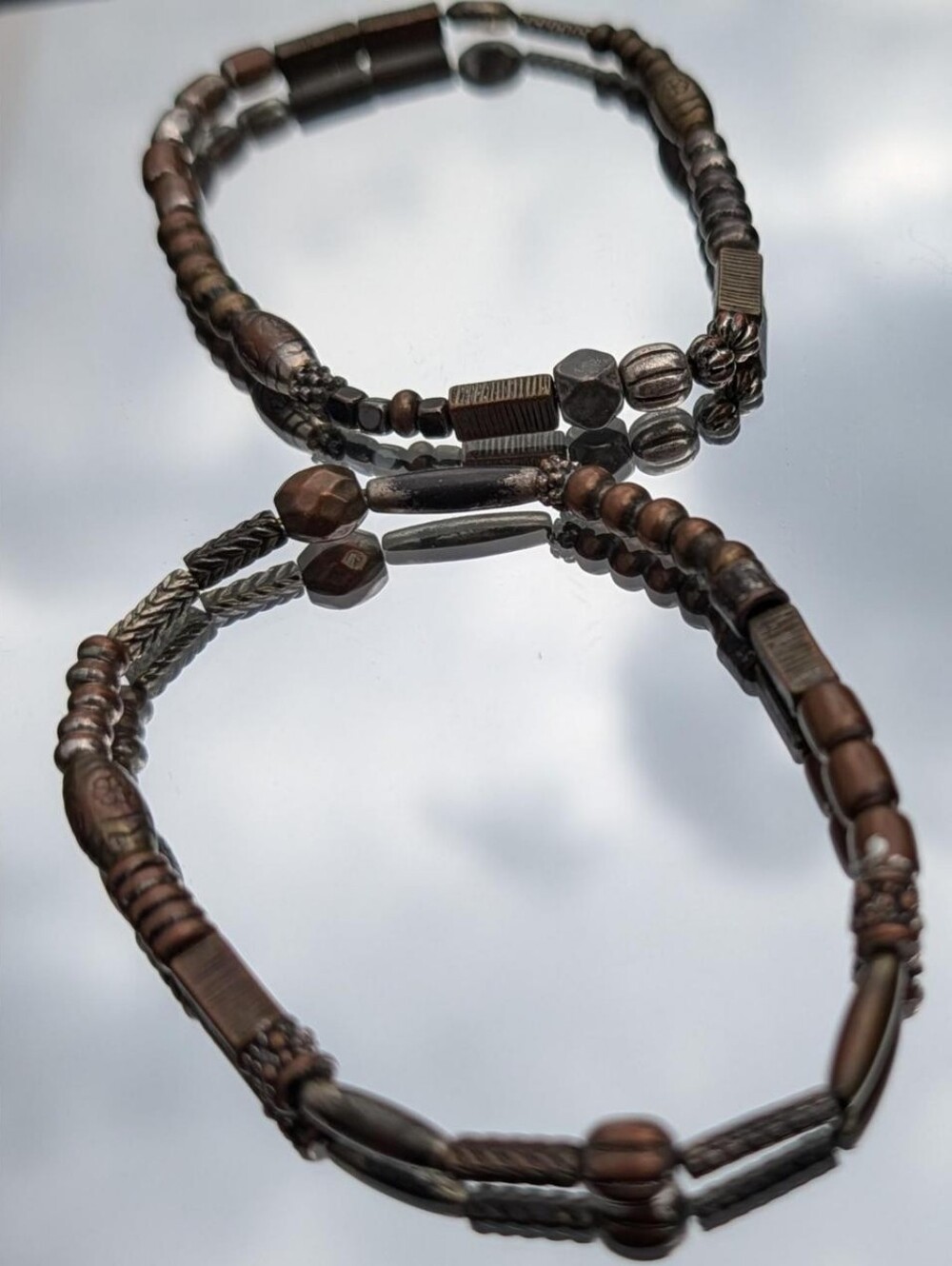 Set of Two Bronze Tone Metal Beaded Elastic Bracelets with Stamped Beads